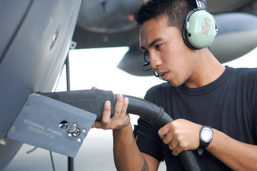Airman 1st Class Philip Yago connects a plug to the external power receptacle of an HC-130P Nov. 28 at Moody Air Force Base, Ga. The 723rd Maintenance Group recently conducted a two-day meeting to find efficiencies and cut waste from the C-130 Hercules isochronal inspection process. Airman Yago is a 723rd Aircraft Maintenance Squadron crew chief. (U.S. Air Force photo/Airman 1st Class Schelli Jones)