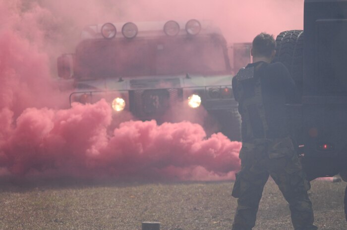 Senior Airman Pavlos Plakakis, 437th Security Forces Squadron, engages in fire during expeditionary combat skills training at Charleston Air Force Base, S.C., Nov. 16, 2006.  Expeditionary combat skills training is a three-day tactical operations course preparing Air Force personnel for future deployments. (U.S. Air Force Photo by Staff Sgt. Veronica Fullwood)(Released)