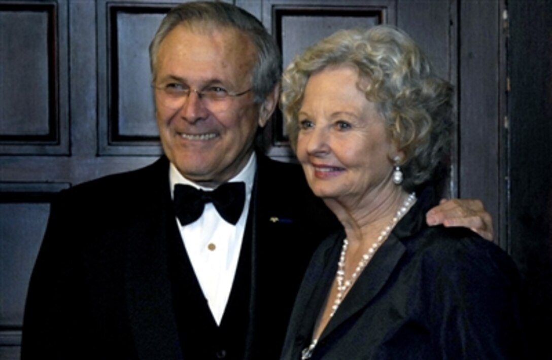 Defense Secretary Donald H. Rumsfeld and his wife, Joyce, have their photo taken backstage prior to the start of the Gold Medal Award Presentation to honor him for his service to the country at the Union League of Philadelphia, Dec. 1, 2006.  Past recipients include Dwight D. Eisenhower, Gen. John J. Pershing, and Abraham Lincoln. 