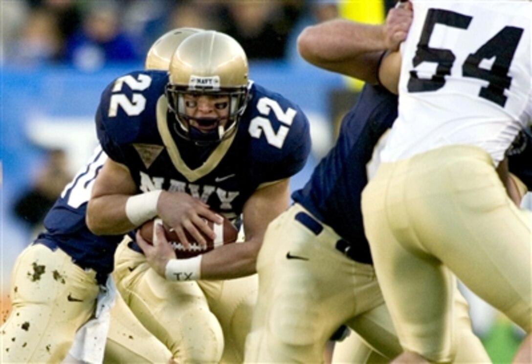 Navy Fullback Adam Ballard (22) breaks down the field in first series play, during the 107th Army-Navy football game at Lincoln Financial Field in Philadelphia, Dec. 2, 2006. Navy won the game 26-14.