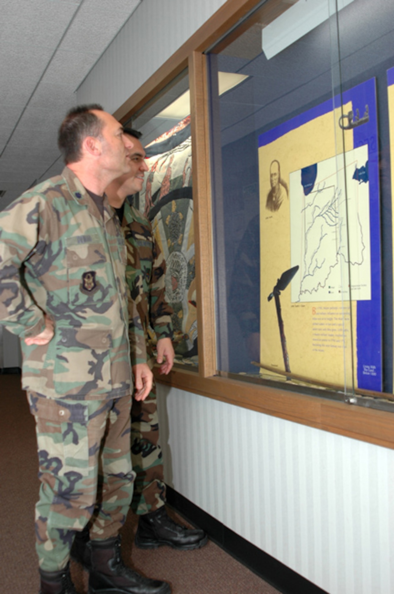 GRISSOM AIR RESERVE BASE, Ind  --  Lt. Col Greg DeMaio (front) and Senior Airman Omar Delacruz view special Native American items that were on display in the 434th Air Refueling Wing Headquarters building during November and early December.  Many of the items on display were associated with the Miami Indian Nation. (U.S. Air Force photo/Senior Airman Ben Mota)