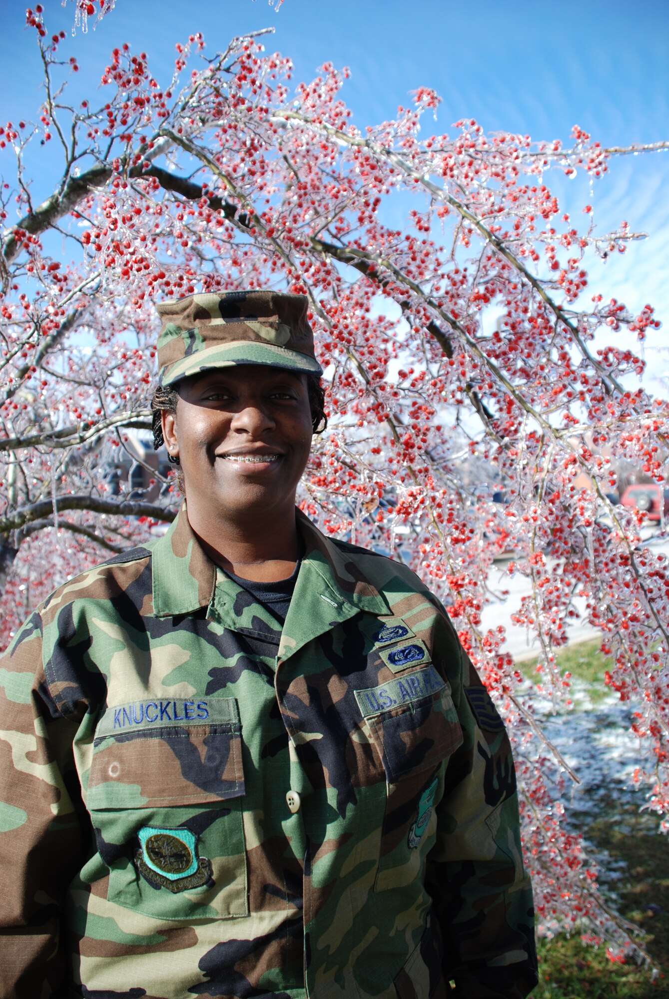 An Air Force Reserve winter wonderland...Tech Sgt. Rhonda Knuckles grins and bears the cold temperature after an ice storm.