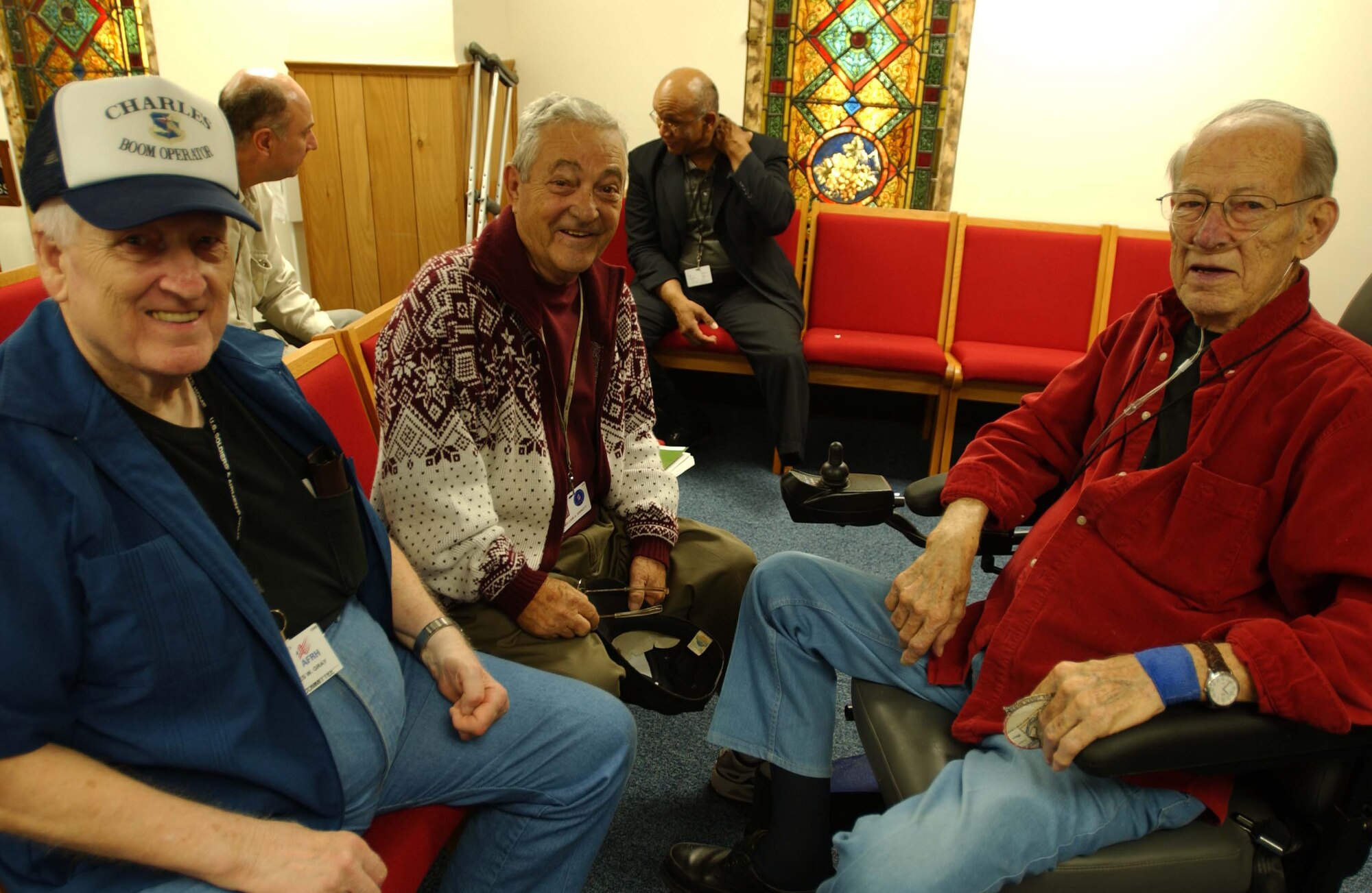 WASHINGTON, D.C. -- Air Force retirees Charles Gray, William Sinott and Bill Fink, pose for a photograph during the 459th Air Refueling Wing's visit to the Armed Force Retirement Home in Washington, D.C., Nov. 16. The retirees were in-flight refuelers known as boom operators. (U.S. Air Force photo by Staff Sgt. Amaani Lyle)