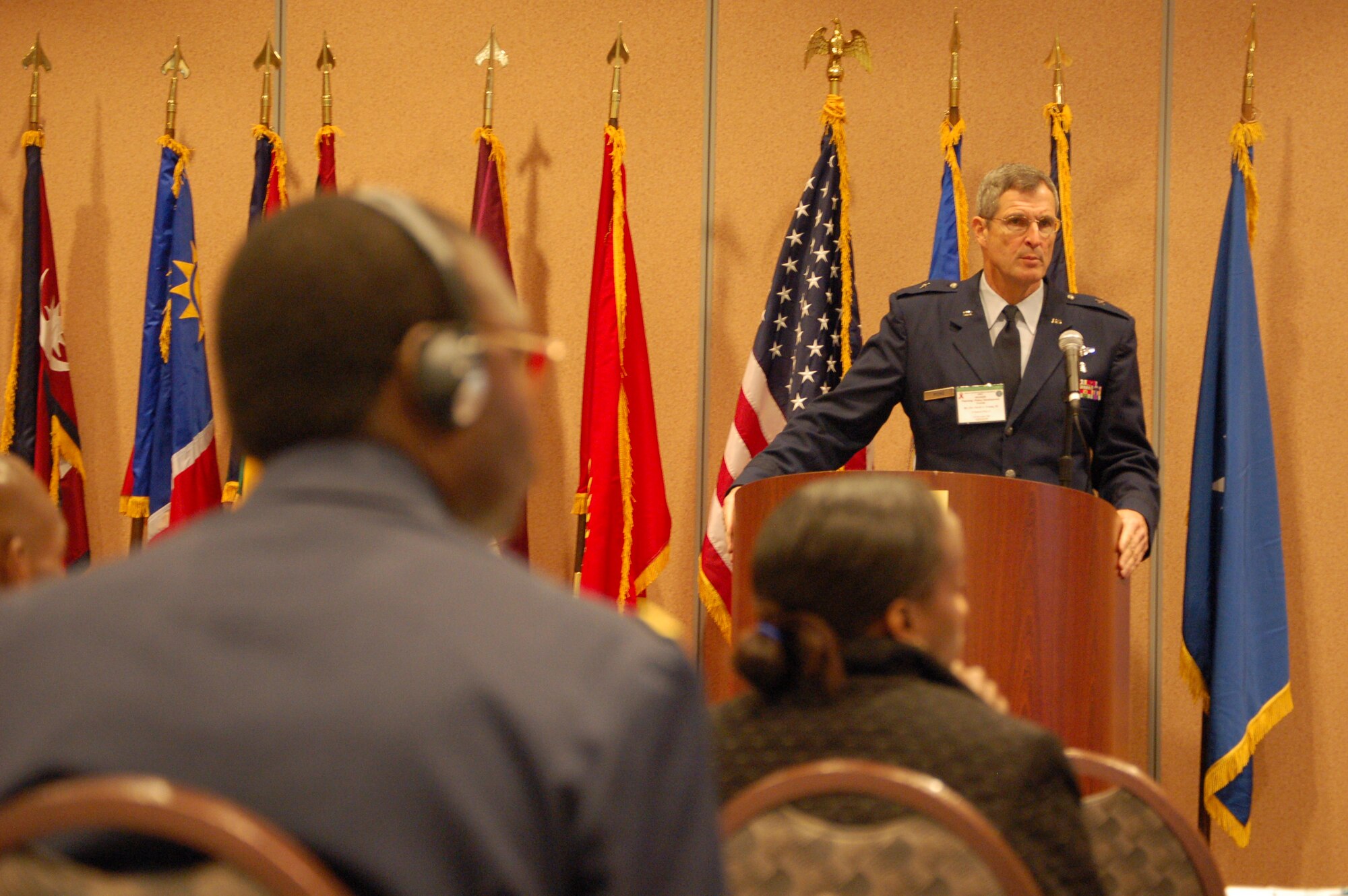 Brig. Gen. (Dr.) David Young, III, commander of the 59th Medical Wing at Lackland Air Force Base, Texas, addresses military healthcare professionals from around the world during the sixth annual HIV/AIDS Strategic Planning and Policy Development course held in San Antonio. The course is designed to help senior military leaders from various nations develop and implement effective HIV/AIDS prevention strategies in their countries. (U.S. Air Force photo/Staff Sgt. Matthew Bates)