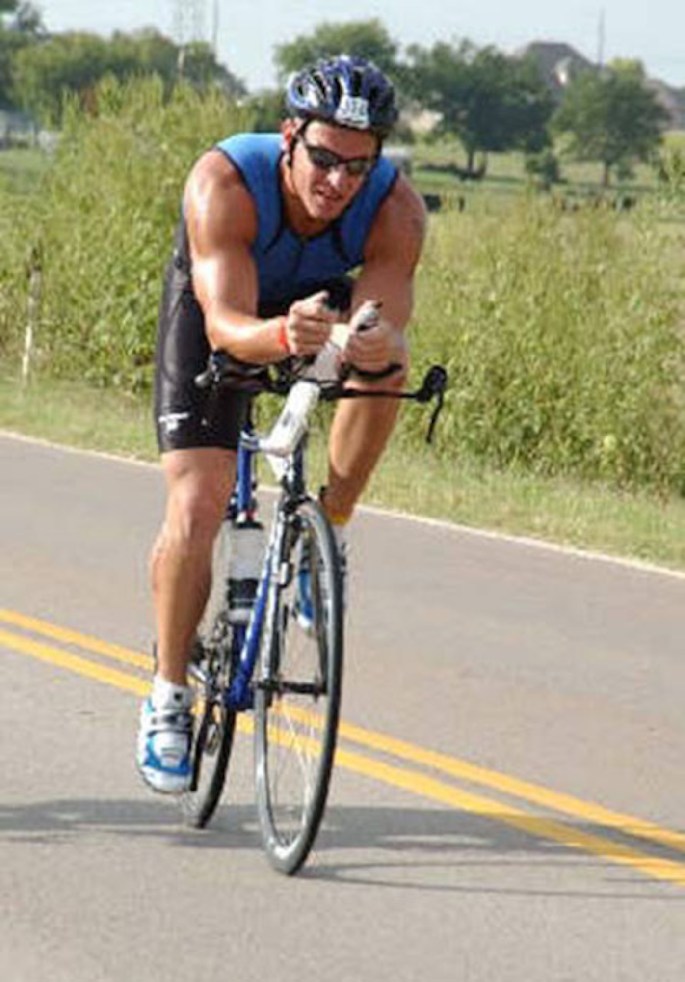 Capt. Robert Atkins rode the bike portion of the Half Iron Redman Triathlon, 56
miles, in 2 hours, 50 minutes, and 14 seconds.
