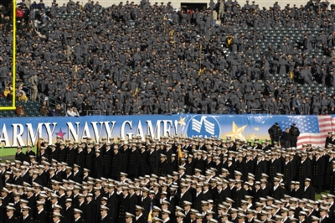 The Naval Academy midshipmen march onto the field prior to the start of the 2006 Army-Navy game in Philadelphia, Dec. 2, 2006.  The midshipmen won, 26-14, over the Black Knights of the Military Academy in the 107th Army-Navy football game.