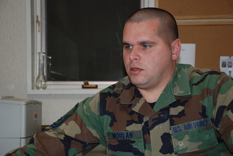 Master Sgt. Chris Morlan checks his computer for the latest information.  He works with a variety of groups in the military to help younger Airmen.  He attended the Human Resources Development Council meeting recently.  He was also named Air Force Reserve Command Career Assistance Advisor of the Year for 2005.