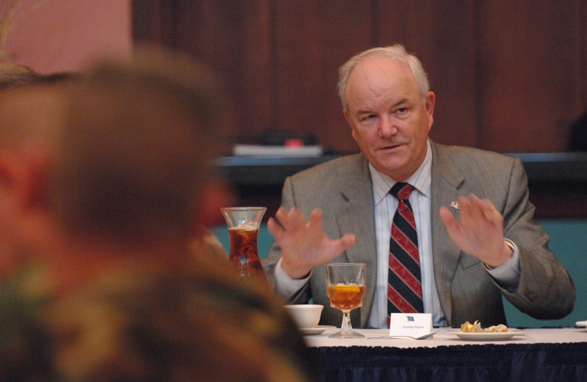 Secretary of the Air Force Michael W. Wynne talks to senior noncommissioned officers at the La Bella Vista Club to get an orientation of the 31st Fighter Wing Mission Dec. 5 at Aviano Air Base, Italy. Secretary Wynne is responsible for the affairs of the Department of the Air Force, and ensures the Air Force can meet its current and future operational requirements.  (U.S. Air Force photo/Staff Sgt. Michael Holzworth)