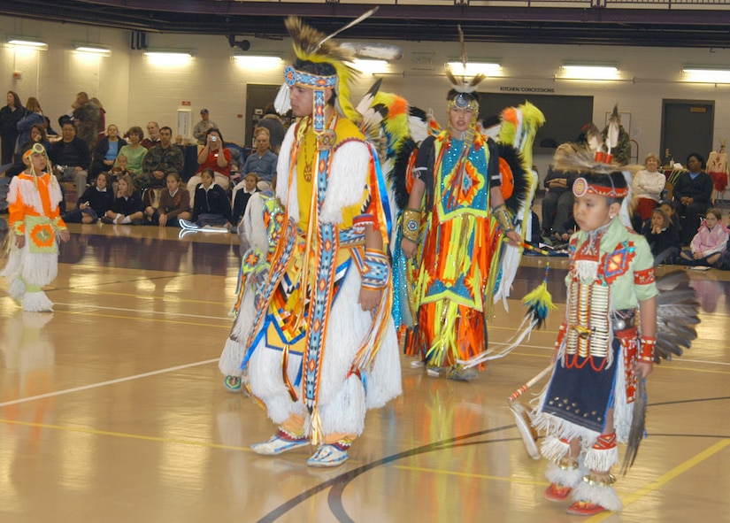 Members of the Winnebago Indian Tribes dance team, perform authentic Native American ceremonial dances at the Lied Activity Center in Bellevue, Neb., on Nov. 15, 2006.  The tribal dance performance was the highlight of the culture fair events, held as part of Native American Heritage Observance month.  (Air Force Photo by Daniel J. Rohan Jr.)