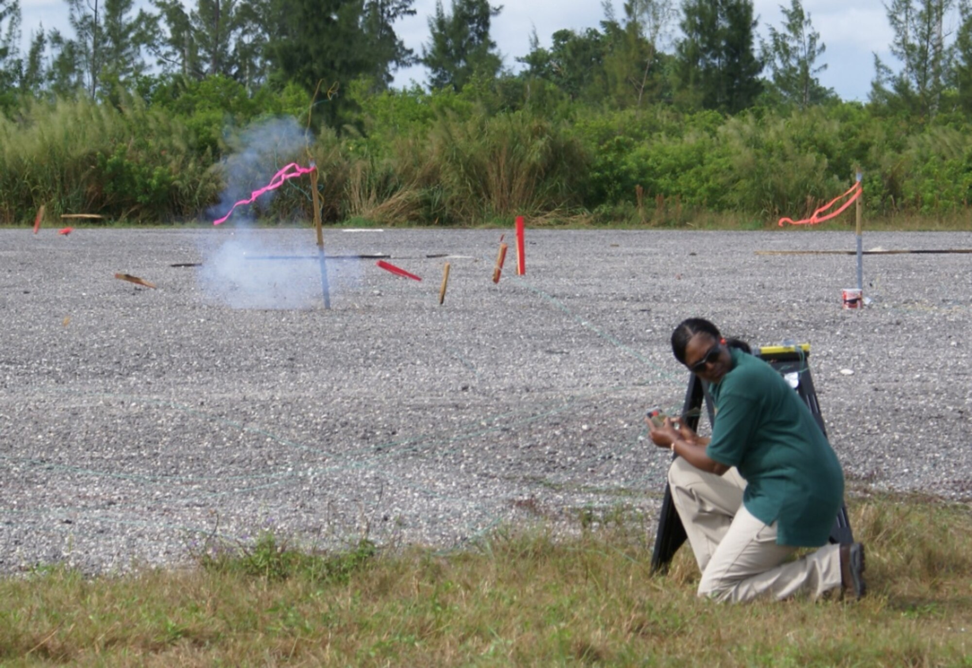 In order to help students understand the power of even the smallest devices, FBI explosives experts demonstrated the strength of a blasting cap in a 2x4 plank of wood during the FBI post-blast forensics training here at Homestead Air Reserve Base, Fla. Nov 8 and 9. Blasting caps are used to set off more powerful explosives. (U.S. Air Force photo/Dan Galindo)