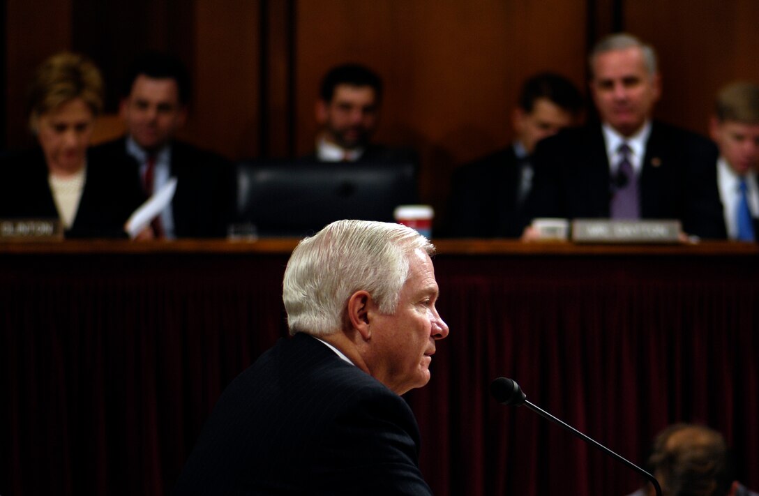 Dr. Robert Gates, defense secretary nominee, responds to questions during a Senate Armed Services Commitee hearing regarding his confirmation, Dec. 5, 2006.  