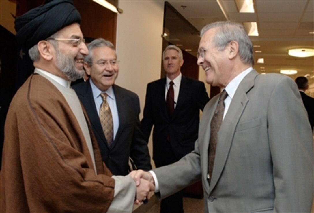 Secretary of Defense Donald H. Rumsfeld hosts the visit of Sayid Abd al-Aziz al-Hakim, chairman of the Supreme Council for the Islamic Revolution in Iraq and a member of the Iraqi Council of Representatives, to the Pentagon on Dec. 5, 2006.   