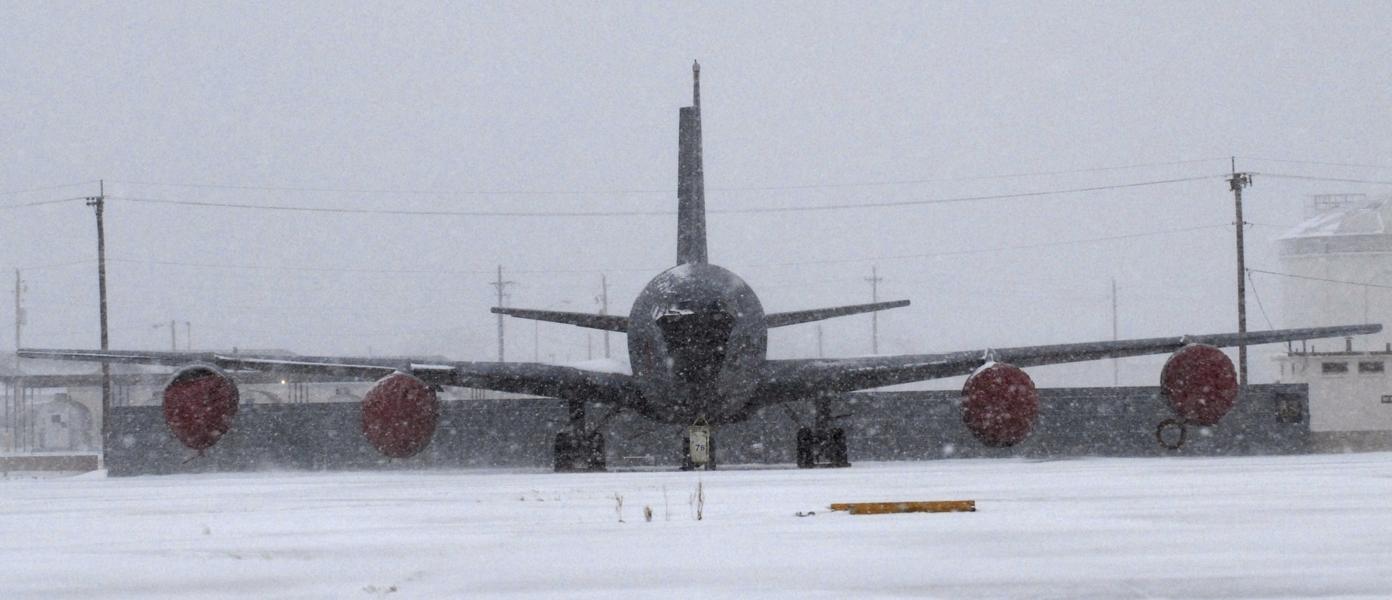 An Altus KC-135 received a fresh coat of snow when a blizzard hit Altus Nov. 30.  The snowfall, which lasted from early morning to late evening caused the base to go to minimal manning.  Altus Air Force Base received 5-1/2 inches of snowfall, breaking the previous record of 3.9 inches for the month of November.  The cold front brought in record-breaking temperatures as well, sinking as low as 4 degrees the morning of Dec. 1.  (U.S. Air Force photo/Senior Airman Joshua DeMotts)