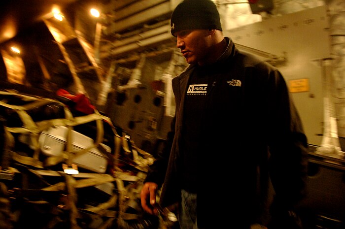 Randy Orton, a World Wrestling Entertainment, Inc. star boards a C-17 Globemaster III, Charleston Air Force Base, S.C.  The 437th Aerial Port Squadron hosts the WWE stars and crew before a flight to Ramstein Air Base, Germany, Dec. 5, 2006. The WWE is performing for troops deployed overseas during a holiday tour put together by Armed Forces Entertainment. This will be the fourth time the WWE has teamed with Armed Forces Entertainment to entertain deployed troops.


(RELEASED)(U.S. Air Force photo by Airman 1st Class Nicholas Pilch)