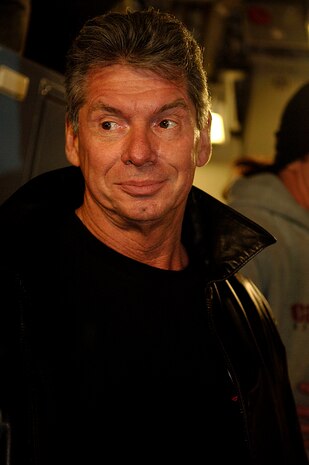 Vince McMahon, the Chairman of the Board of the World Wrestling Entertainment, Inc. boards a C-17 Globemaster III at Charleston Air Force Base, S.C.  The 437th Aerial Port Squadron hosts the WWE stars and crew before a flight to Ramstein Air Base, Germany, Dec. 5, 2006. The WWE is performing for troops deployed overseas during a holiday tour put together by Armed Forces Entertainment. This will be the fourth time the WWE has teamed with Armed Forces Entertainment to entertain deployed troops.


(RELEASED)(U.S. Air Force photo by Airman 1st Class Nicholas Pilch)