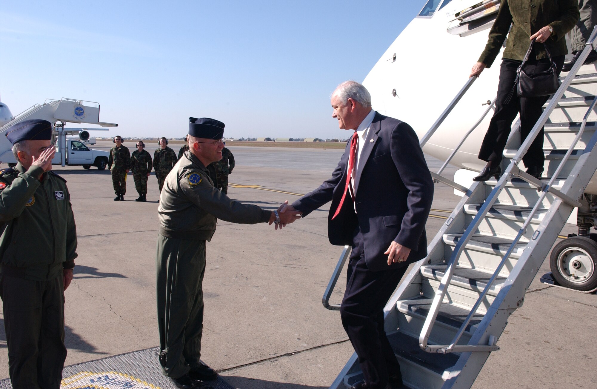 Secretary of the Air Force Michael Wynne shakes hands with Col. "Tip" Stinnette, 39th Air Base Wing commander, after landing here Tuesday. Secretary Wynne visited Incirlik and met with troops. (U.S. Air Force photo by Airman 1st Class Nathan Lipscomb