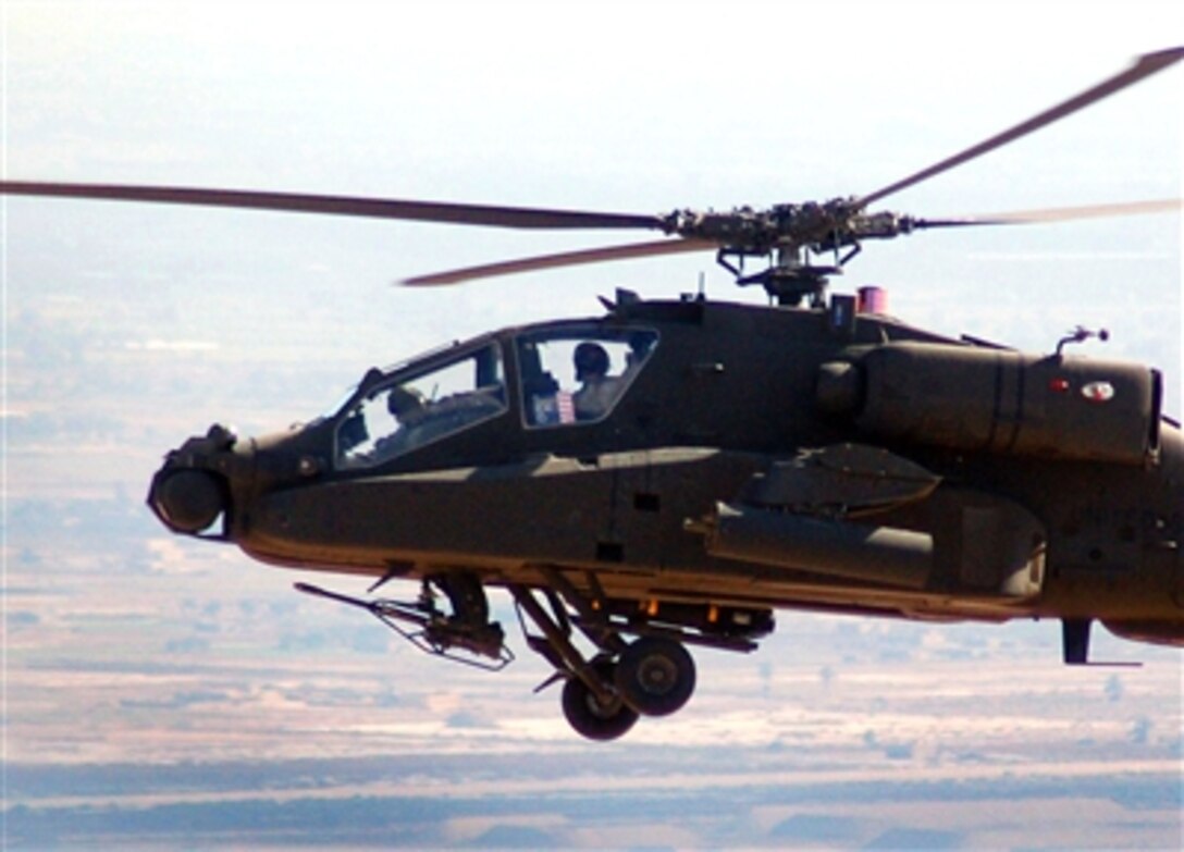 An AH-64 Apache helicopter from the U.S. Army's 1st Cavalry Division provides close air support for a mission being conducted by the 25th Infantry Division, Nov. 30, 2006. 