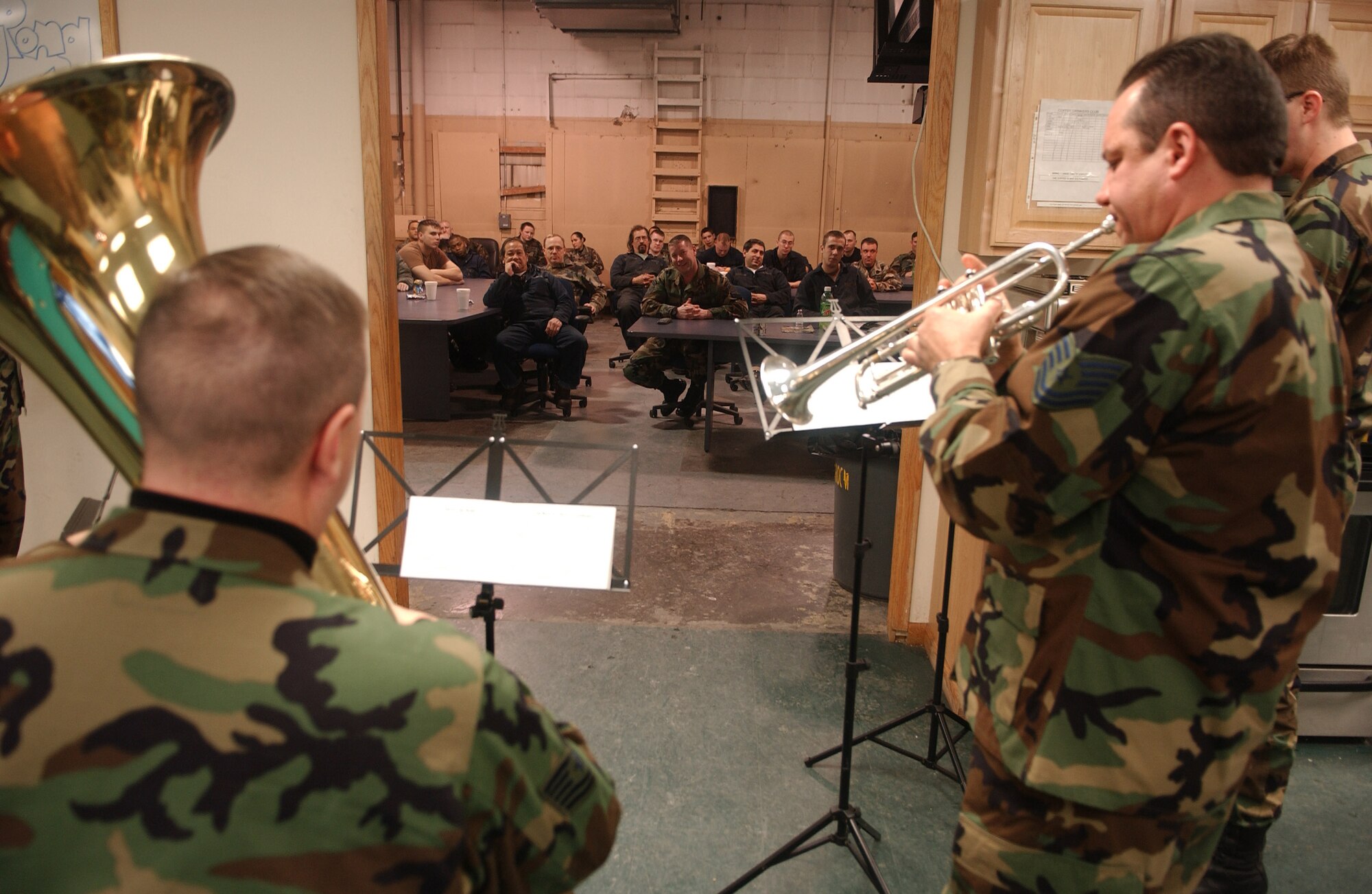 EIELSON AIR FORCE BASE, Alaska -- Members of the PACAF Alaska Brass Quintet play "Holiday favorites" here Dec. 6 at the 354th Logisitics Readiness Squadron. 354th Fighter Wing, Eielson Air Force Base, Alaska.(U.S. Air Force photo by Senior Airman Anthony Nelson.)
