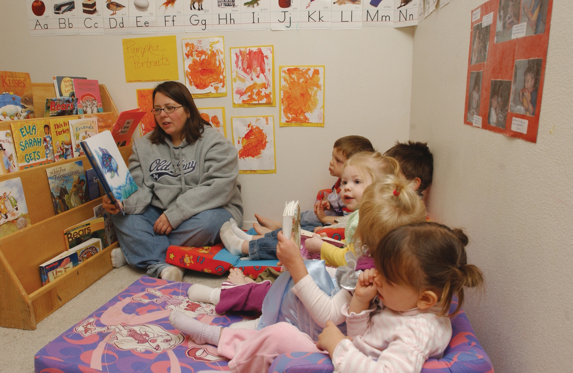 Kristi Morgan was named the Elmendorf Air Force Base Family Child Care Provider of the Year for 2006 Nov. 16. Kristi has been providing child care on Elmendorf for more than two years and has plans of making child development her life-long career. Family Child Care makes up 40 percent of the child care in the Air Force. (U.S. Air Force photo by Staff Sgt. Rhiannon Willard)                         