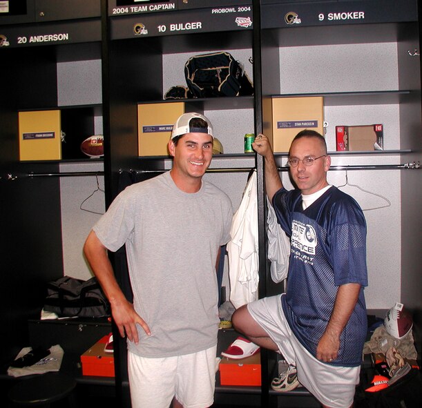 St. Louis Rams quarter back Marc Bulger shows off the locker room.  He and other NFL greats were involved in Kurt Warner's First Things First flag football games, along with Reservists from the 932nd Airlift Wing.