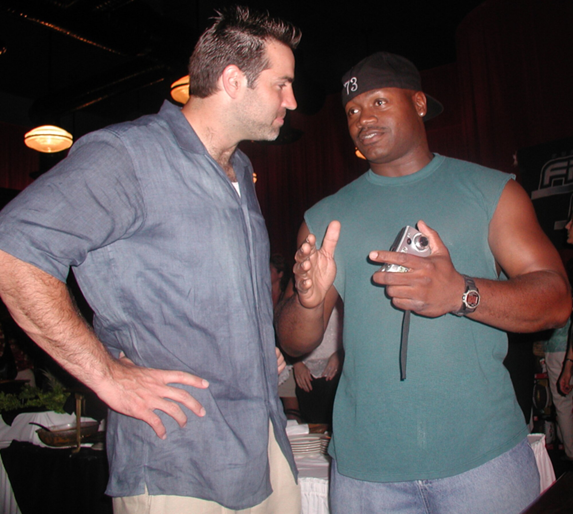 National Football League quarterback Kurt Warner meets Tech Sgt. Rico Walker of the 932nd Airlift Wing.