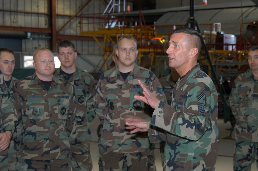 Chief Master Sgt. Joseph Barron, Jr., Air Mobility Command, command chief, speaks to members of the 317th Maintenance Squadron Tuesday. He visited the 317th Airlift Group to thank the members of AMC?s ?busiest? C-130 unit for their excellent work keeping Hercs in the sky. (U.S. Air Force photo/Airman 1st Class Carolyn Viss)           