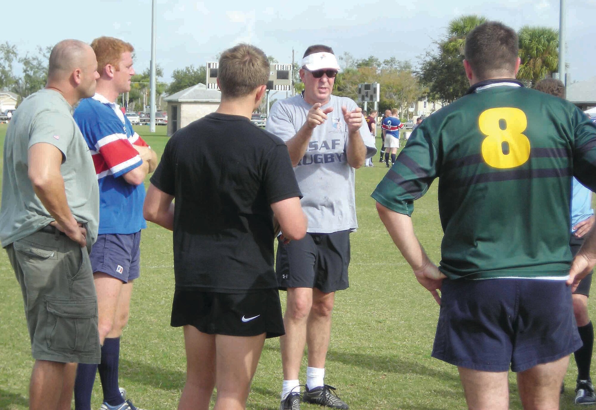 Chief Master Sgt. Craun Fansler, 20th Aircraft Maintenance Squadron superintendant, gives advice to the Armed Forces Rugby Team Dec. 2 at the National All-Star Championship in Orlando, Fla. (U.S. Air Force photo/Angus Young)