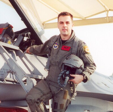 Maj. Troy Gilbert, an F-16 Falcon pilot who was killed in a crash near Baghdad, Iraq, Nov. 27, has roots Sheppard. He was a 2000 graduate of the Euro-NATO Joint Jet Pilot Training program and his parents, Ron and Kaye Gilbert, reside in Wichita Falls. Major Gilbert stand on the ladder of an F-16 at Luke Air Force Base, Ariz. (Photo courtesy of the Gilbert Family)