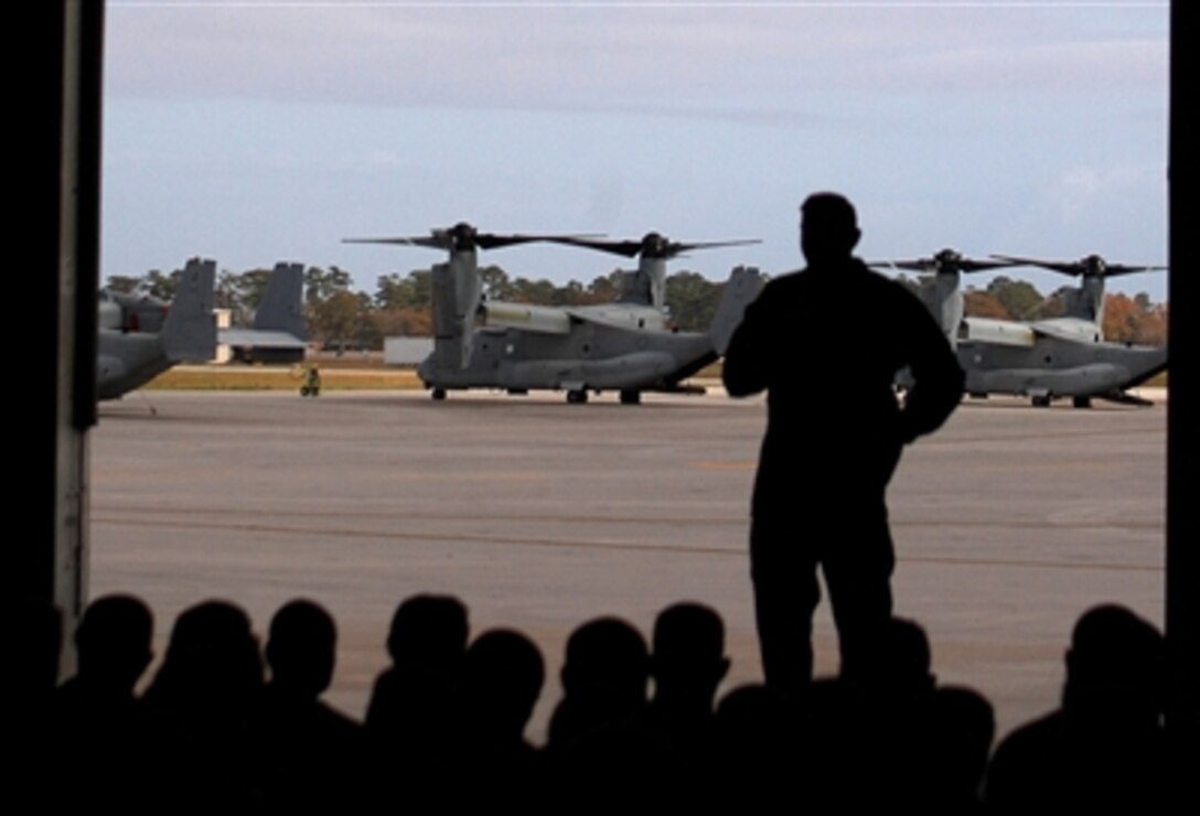 Commandant of the Marine Corps Gen. James. T. Conway addresses troops inside a helicopter hangar aboard the air station and describes some of the items listed in his 2006 planning guidance in New River, N.C., Nov. 30.