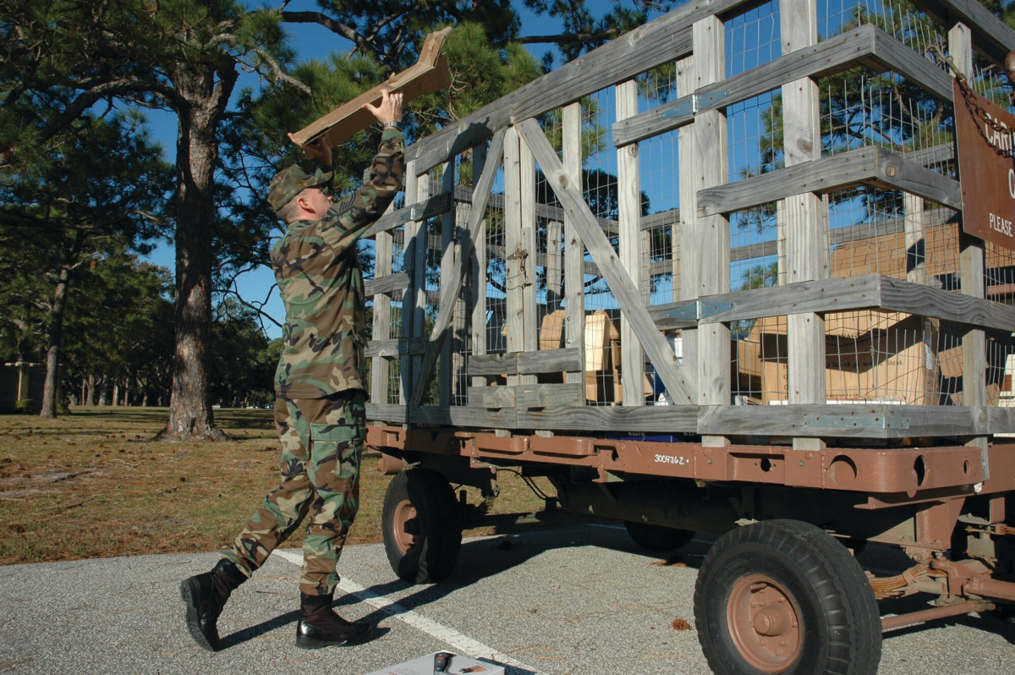 TYNDALL AIR FORCE BASE, Fla. --  Master Sgt. Travis Fritts, 325th Fighter Wing career assistance advisor, does his part in conservation by recycling a cardboard box at the recycling drop-off across from the First Term Airmen's Center. When recycling cardboard, empty its contents and the remove any plastic connected to the box, then breakdown the box so it is easier for the recycling center staff to pick up. (U.S. Air Force photo by Staff Sgt. Stacey Haga)