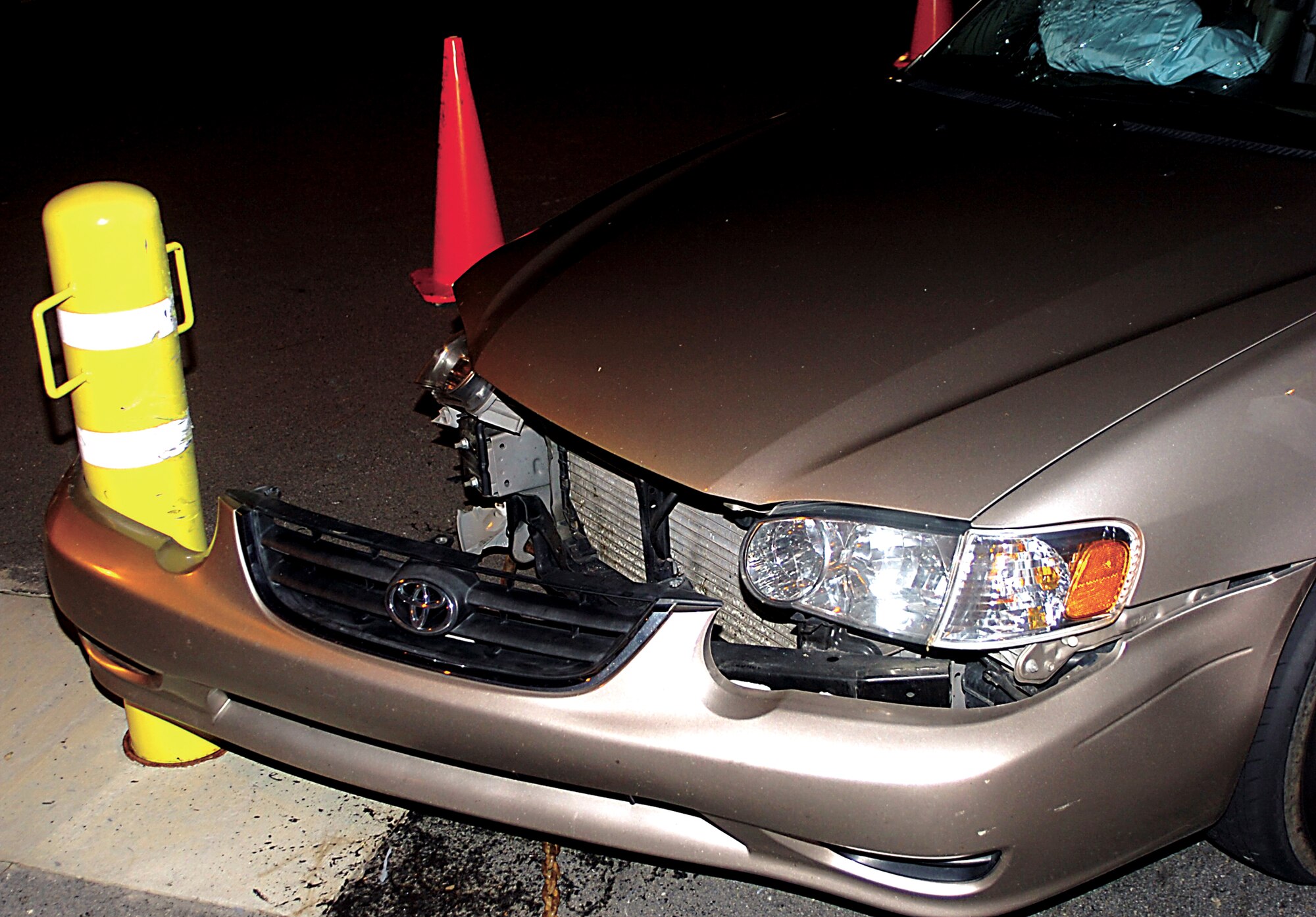 SEYMOUR JOHNSON AIR FORCE BASE, N.C. - A privately-owned vehicle  is mangled by a security bollard at an installation entry point. (U.S. Air Force photo by Airman 1st Class Jonathon Williams)
