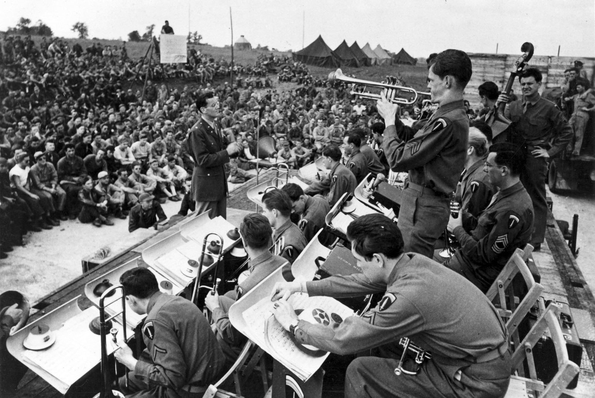 Maj. Glenn Miller conducts the band during an open air concert. (U.S. Air Force photo)