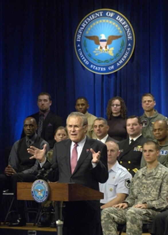 Secretary of Defense Donald H. Rumsfeld addresses the audience during a town hall meeting in the Pentagon in Arlington, Va., on Dec. 8,2006.  Rumsfeld, who will relinquish his post to Robert Gates next week, took questions from Pentagon employees and looked back on the last six years of his second term as defense secretary.   