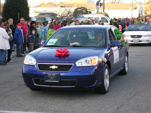 The 916th Air Refueling Wing's Commander, Col. Paul J. Sykes and his wife, Patricia wave to the crowd during Goldsboro's annual Christmas parade. The 916th ARW flies the KC-135R Stratotanker which provides aerial refueling on a global scale.      