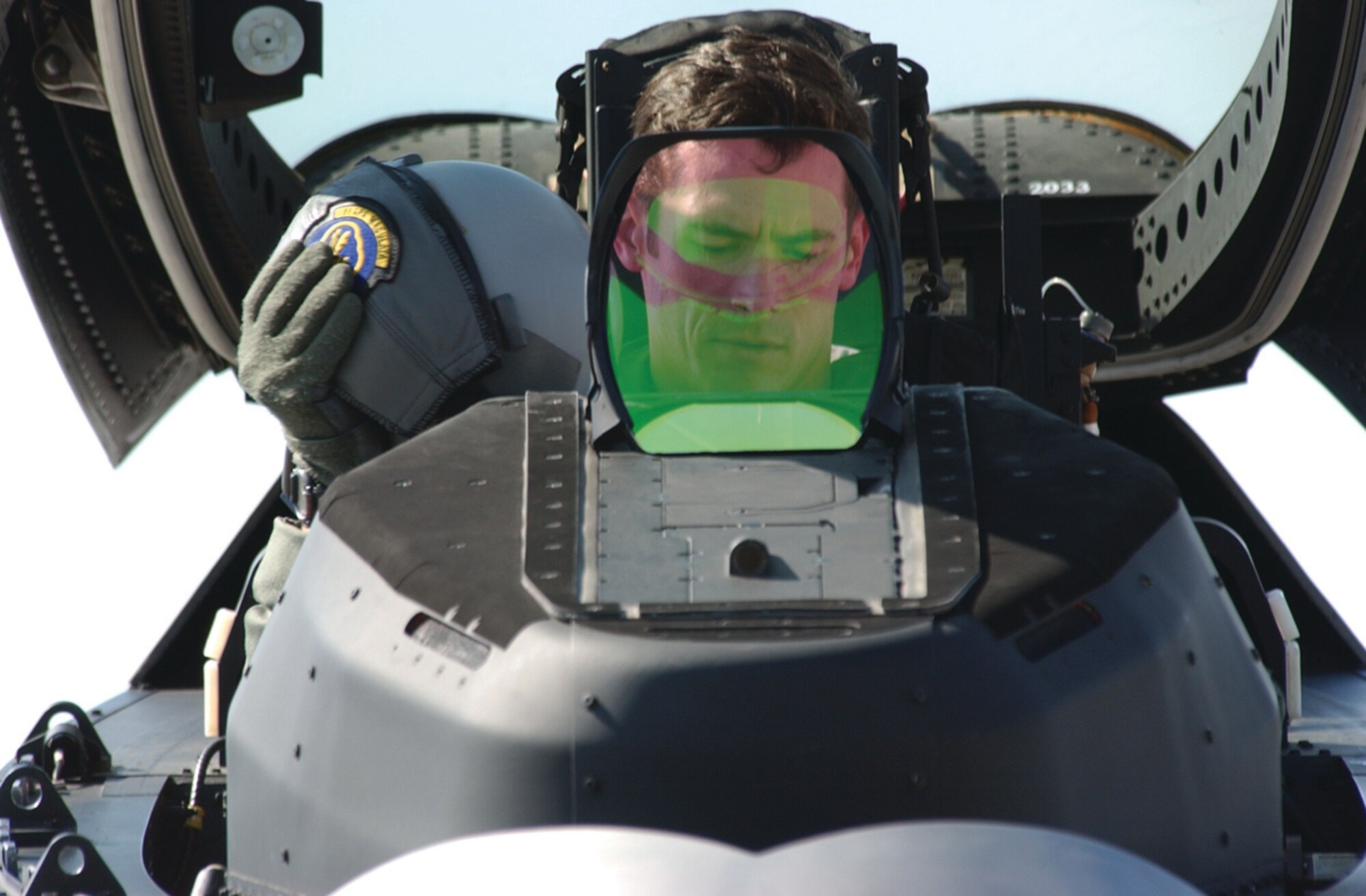 TYNDALL AIR FORCE BASE, Fla. --  Maj. Paul Moga, 43rd Fighter Squadron pilot, gets ready to exit his F-22 Raptor cockpit after landing on Tyndall’s runway. He has since moved from the 43rd FS to be the Air Force’s first Raptor demonstration pilot. (U.S. Air Force photo by 1st Lt. Will Powell)