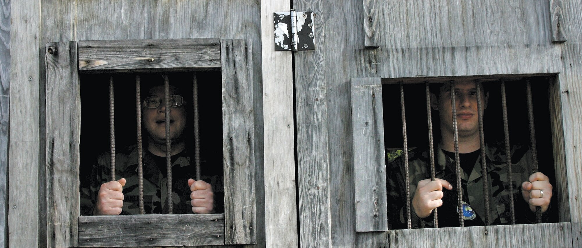 Staff Sgt. Ronald Roe, 43rd Maintenance Squadron and Tech. Sgt. John Stanley, 43rd Logistics Readiness Squadron, serve their jail sentence.
