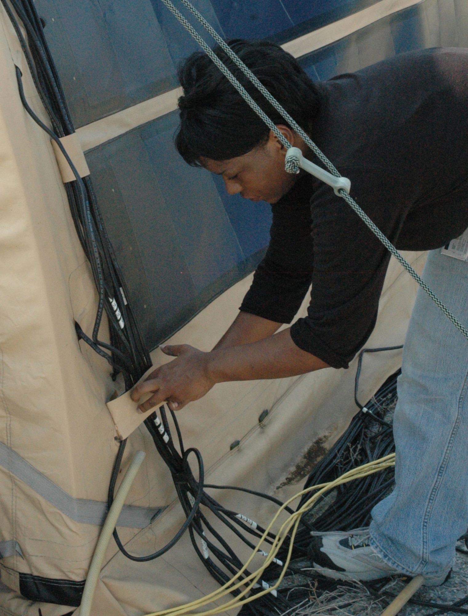 TYNDALL AIR FORCE BASE, Fla. --  Miriam Keith, an electrical engineer and the lead researcher on solar energy here, is developing flexible solar panels that will supply energy to tents used at deployed locations. The panels are lighter and cleaner than diesel generators, which are expensive and difficult to transport. (U.S. Air Force photo by 1st Lt. Amanda Ferrell)