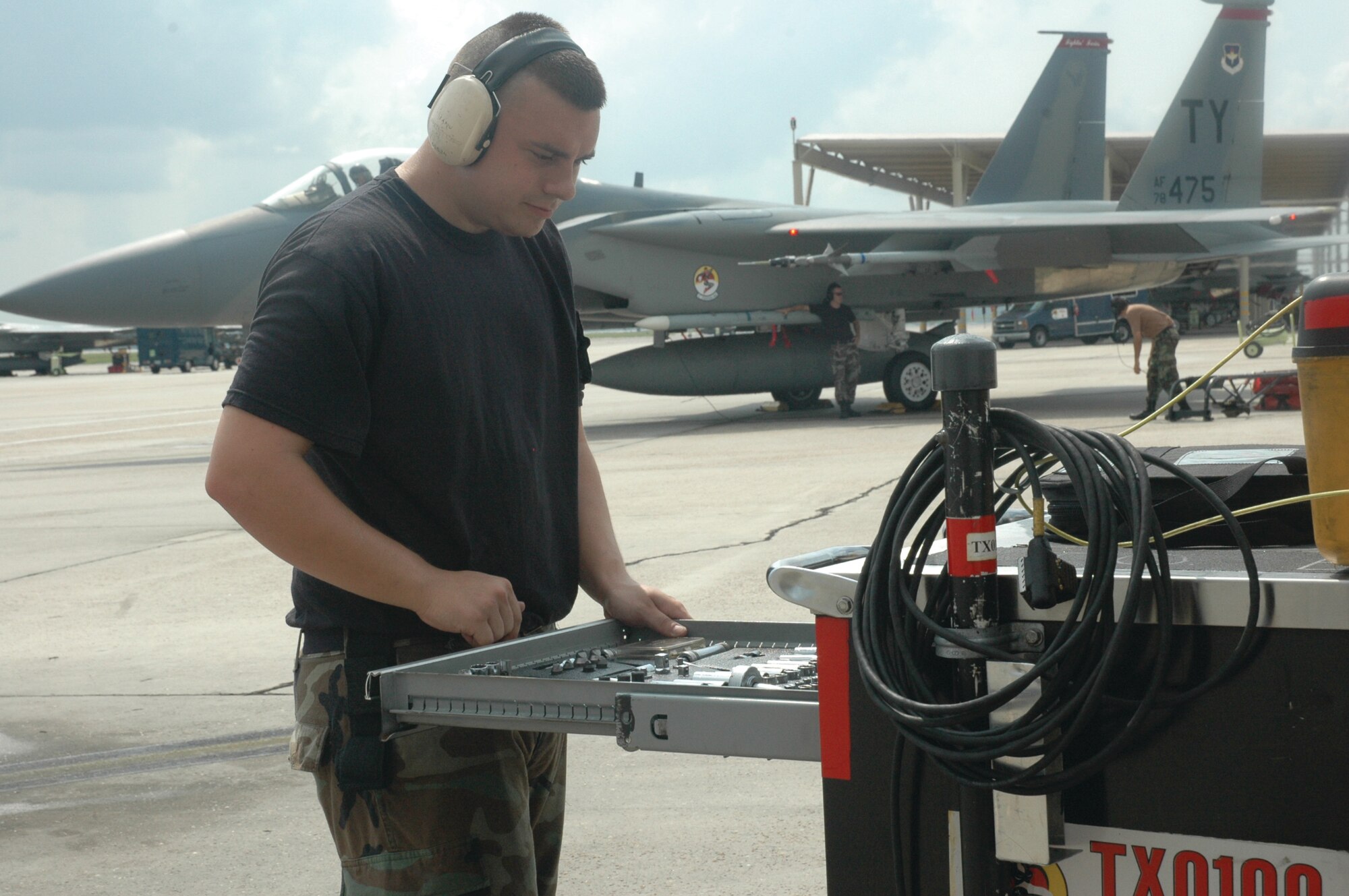 TYNDALL AIR FORCE BASE, Fla. --  Senior Airman Joshua Joslin, 95th Aircraft Maintenance Unit avionics technician, inventories the tool cart after launching an aircraft. Airman Joslin won the Golden Bolt Award in June. He found the Golden Bolt on the runway, near a metal tie down. (U.S. Air Force photo by Chrissy Cuttita)