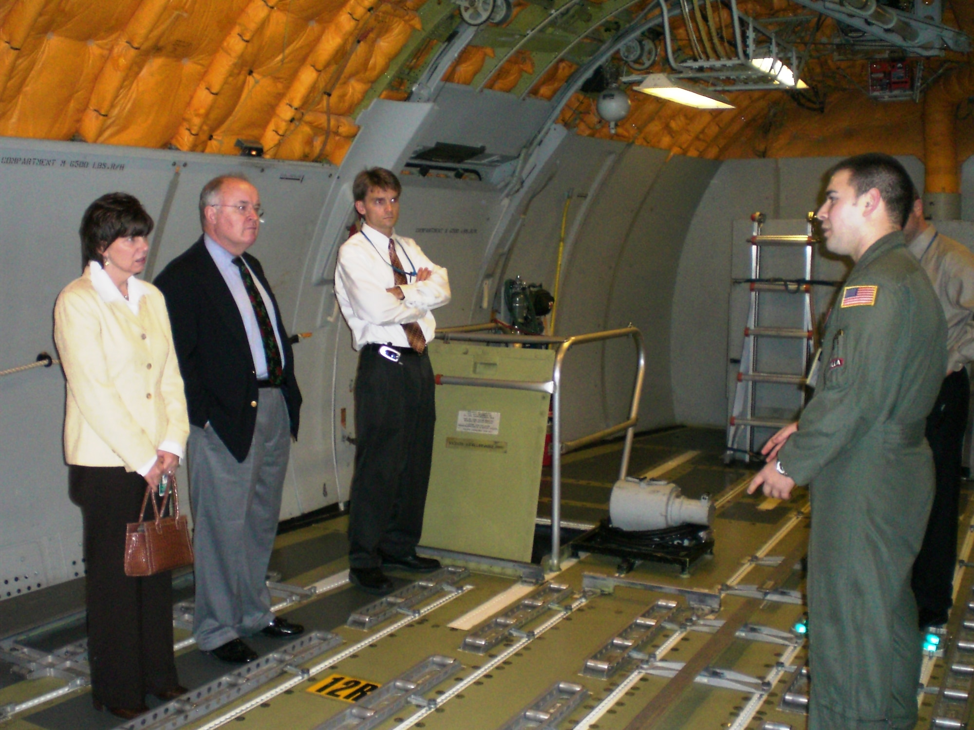 MCGUIRE AIR FORCE BASE, N.J. -- A McGuire member explains the different functions of a KC-10 Extender to a group of local educators. Educators visited McGuire Nov. 29 to learn about the Air Force and its mission. U.S. Air Force Photo by Senior Airman Dilia DeGrego