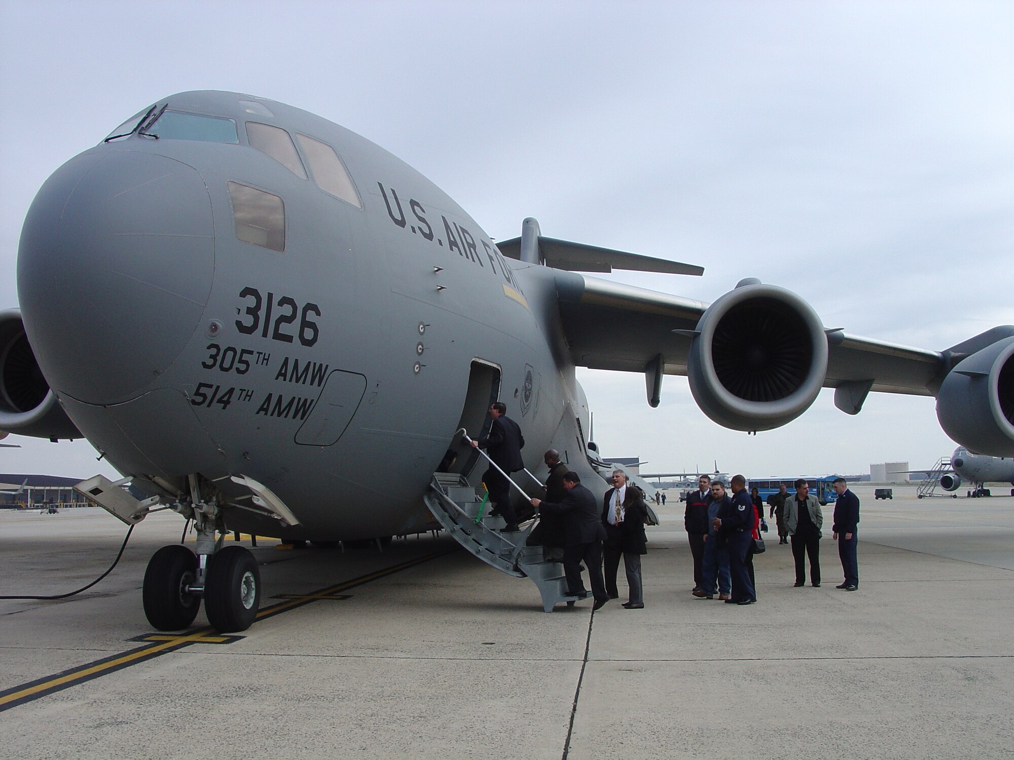 MCGUIRE AIR FORCE BASE, N.J. -- Attendees of the McGuire Educator Community Relations Tour enter a McGuire C-17 static display. More than 30 educators and superintendents from the tri-state area visited McGuire for a one-day tour to learn about the Air Force and McGuire missions. U.S. Air Force Photo by Senior Airman Dilia DeGrego