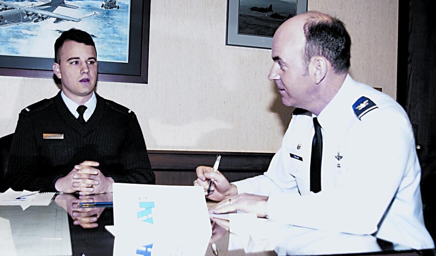 (Photo by Frank McIntyre) 1st Lt Matthew Laski, Air Force Assistance Fund wing project officer, discusses the charities Col Mike Callan, 71st Flying Training Wing commander, can donate to. The AFAF campaign began Monday and runs through April 9. Lieutenant Laski is a member of the 71st Communications Squadron. For more information, call Lieutenant Laski at 7223.