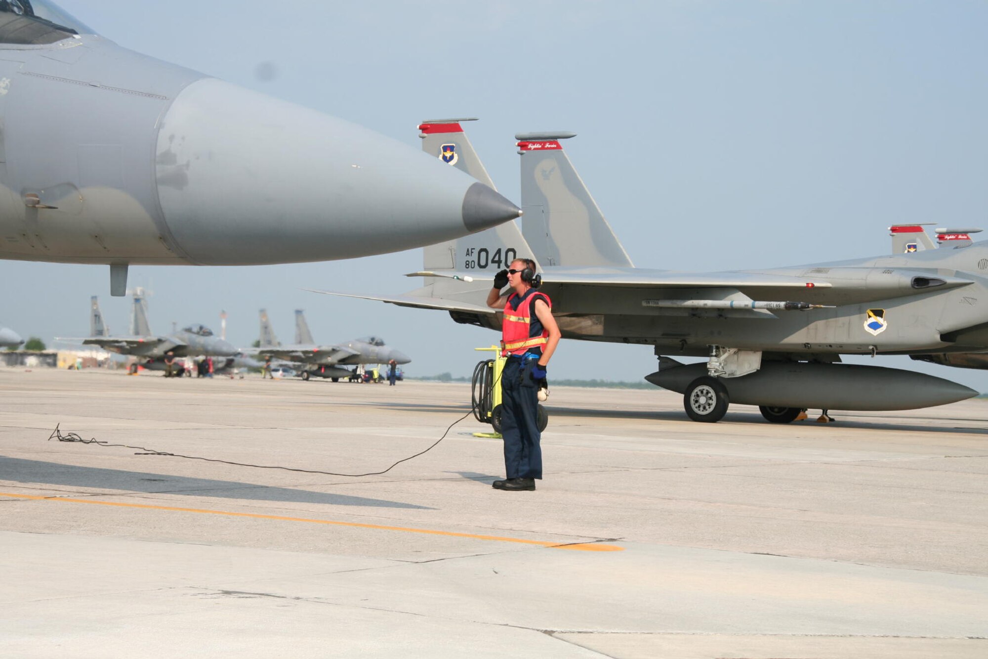 TYNDALL AIR FORCE BASE, Fla. --  Staff Sgt. Robert Donaldson snaps a salute to an Eagle pilot as he prepares to taxi during a sortie flown against dissimilar aircraft this month. Sergeant Donaldson is a 95th Aircraft Maintenance Unit crew chief. (U.S. Air Force photo by Maj. John York)