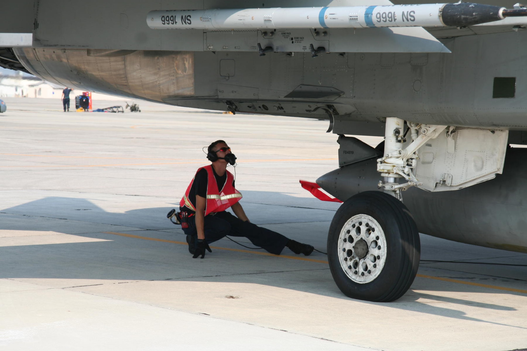 TYNDALL AIR FORCE BASE, Fla. --  Staff Sgt. Robert Donaldson, 95th Aircraft Maintenance Unit crew chief, inspects a Tyndall jet before takeoff. Maintainers and crew chiefs from the 1st and 95th Aircraft Maintenance Units worked together during recent Large Force Employment missions in Savannah, Ga. (U.S. Air Force photo by Maj. John York)