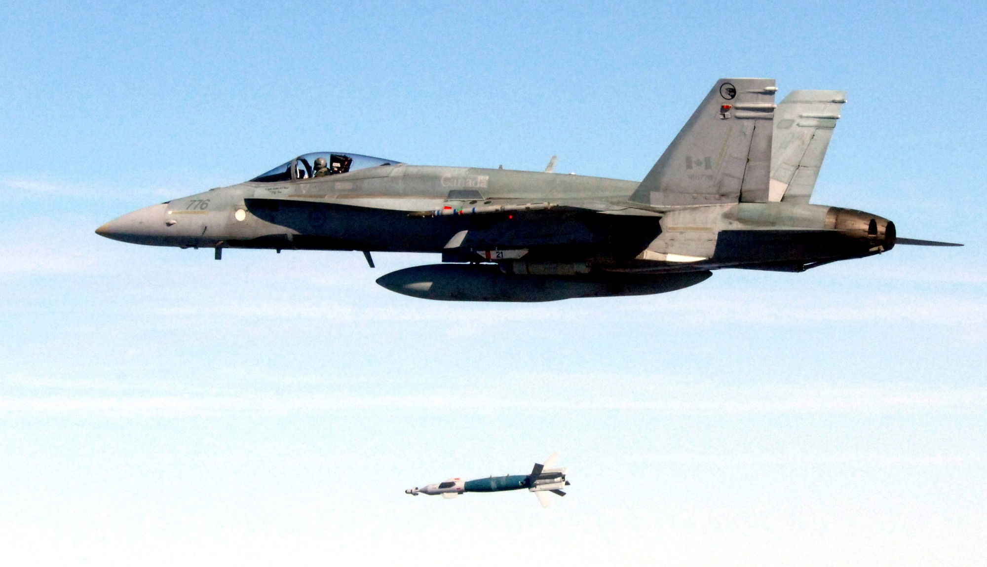 A Canadian CF-18 Hornet from the 409th Tactical Fighter Squadron launches a laser-guided bomb Dec. 5 during one of the unit's weapon systems evaluation program scenarios.  The Canadian aircrew launched 12 LGBs during their week at Eglin Air Force Base, Fla. (U.S. Air Force photo/Lt. Col. Tim Pfeifer)