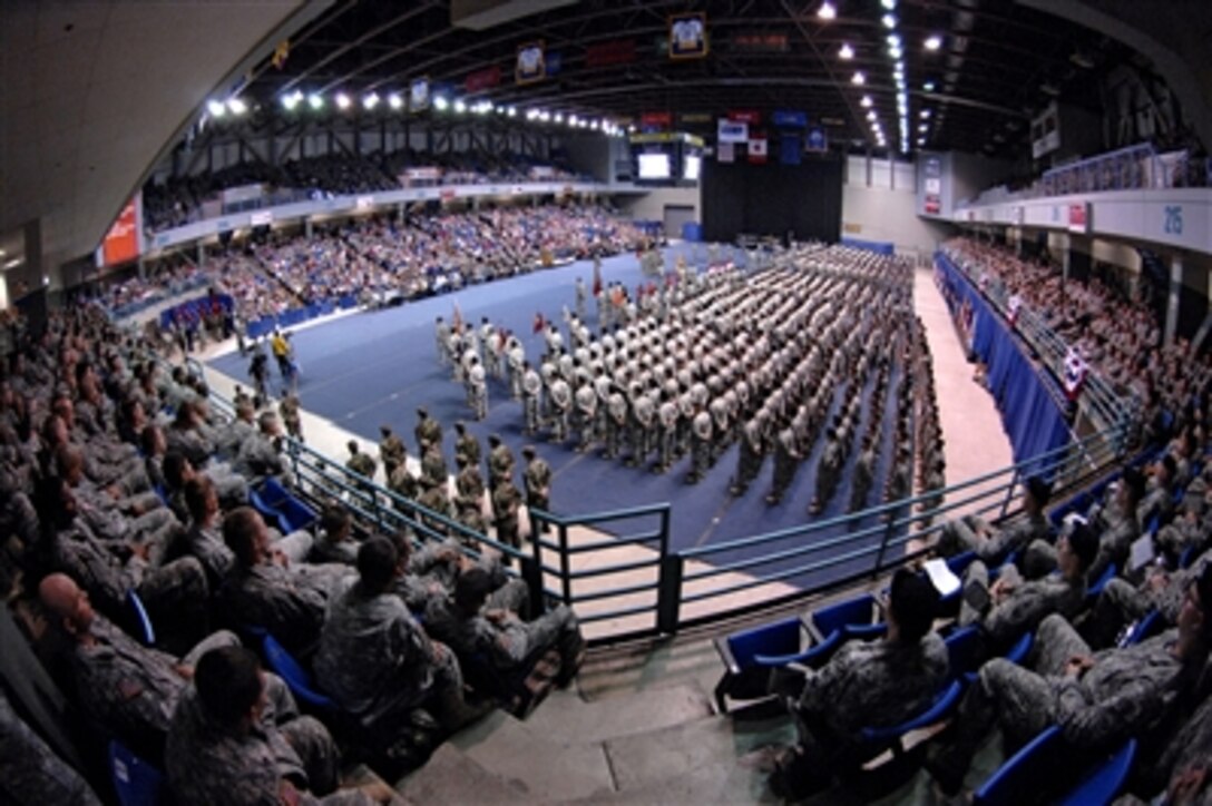 Hundreds of servicemembers, their families and friends fill the stands during the redeployment ceremony of the 172nd Stryker Brigade Combat Team at Fort Wainwright, Alaska, Dec. 12, 2006.