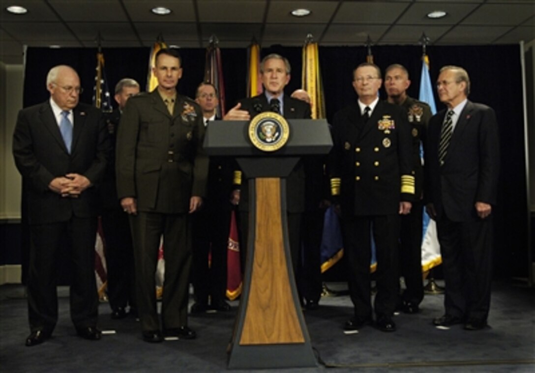 President of the United States George W. Bush talks to the media after meeting with senior defense officials at the Pentagon, Dec. 13, 2006.