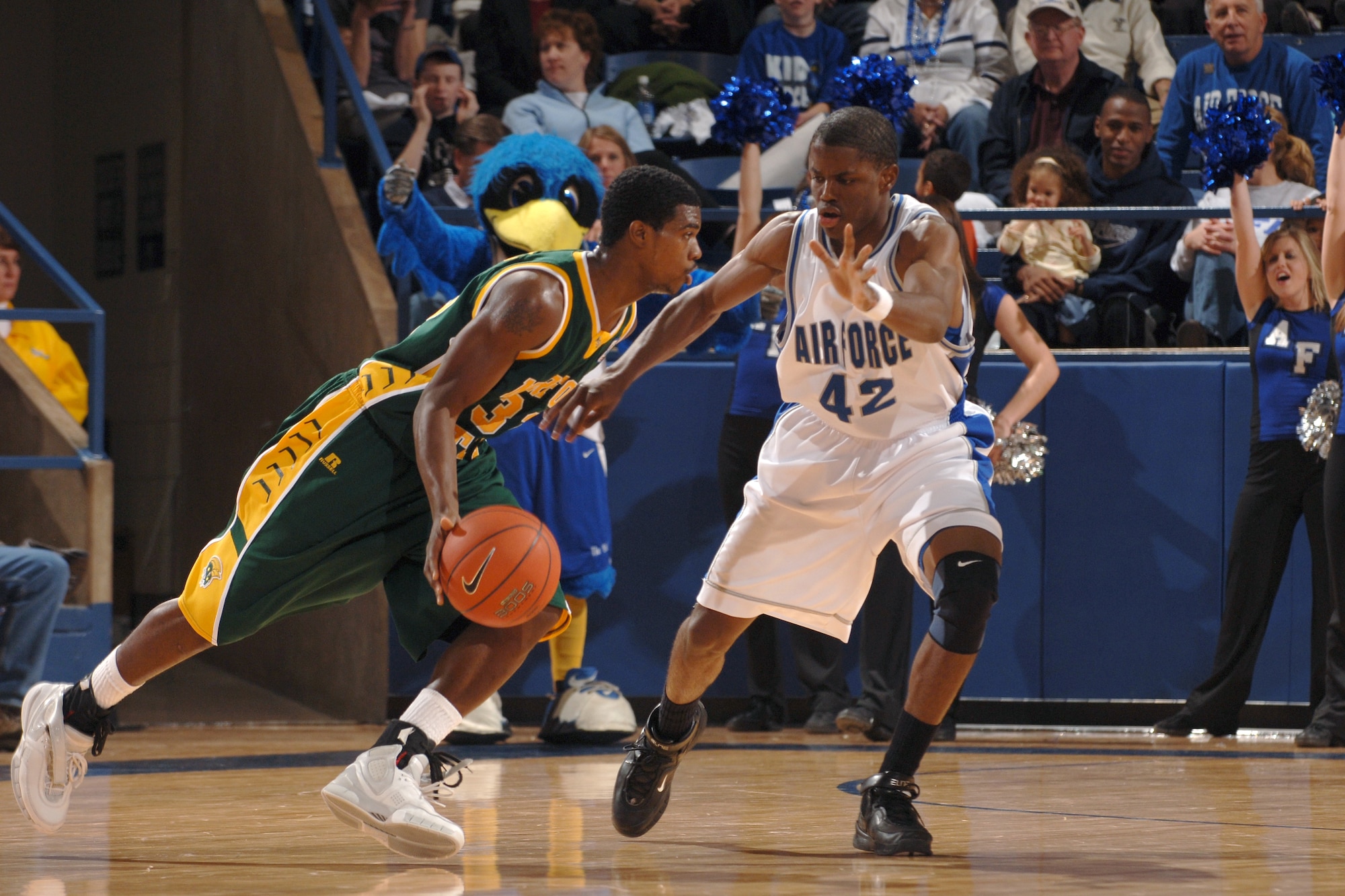 Falcon forward Anwar Johnson defends against Norfolk State's Brandon Plummer Dec. 13 at Clune Arena. The Falcons defense held the Spartans to just 36 percent shooting for a 70-47 victory. (U.S. Air Force photo/Dave Armer)