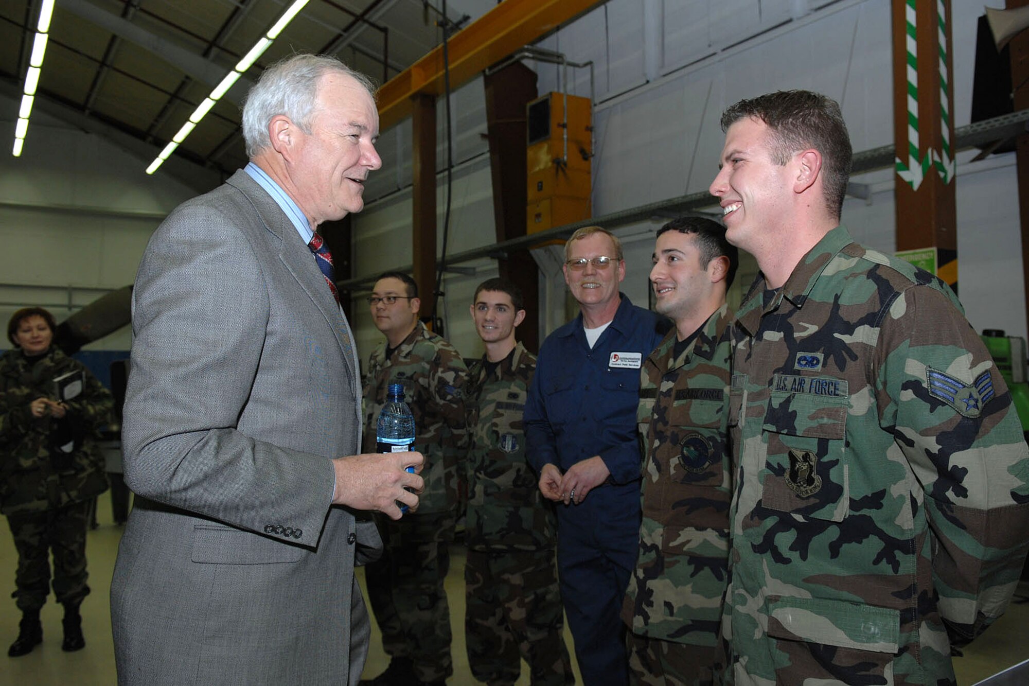 Secretary of the Air Force Michael Wynn talks to Airmen Dec. 12 at the Propulsion Shop of the 86th Maintenance Squadron during a visit to Ramstein Air Base, Germany. (U.S. Air Force photo/Staff Sgt. Rasheen A. Douglas)