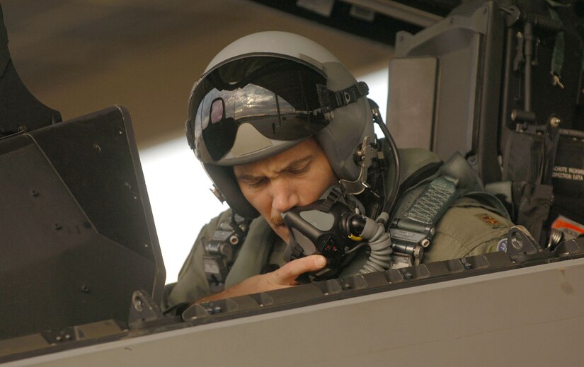 Major Robert "Ghost" Grey, an F-22A Raptor Pilot with 192nd Virginia Air National Guard Unit attached to the 94th Fighter Squadron at Langley AFB in Virginia, goes through start up procedures prior to launch  on Dec. 7, 2006. For well over a year, aircraft maintainers and pilots from the 192nd Virginia Air National Guard Unit based out of Richmond, Va. have slowly intergrated into the F-22A Raptor program at Langley AFB. (USAF Photo By Staff Sgt Samuel Rogers)