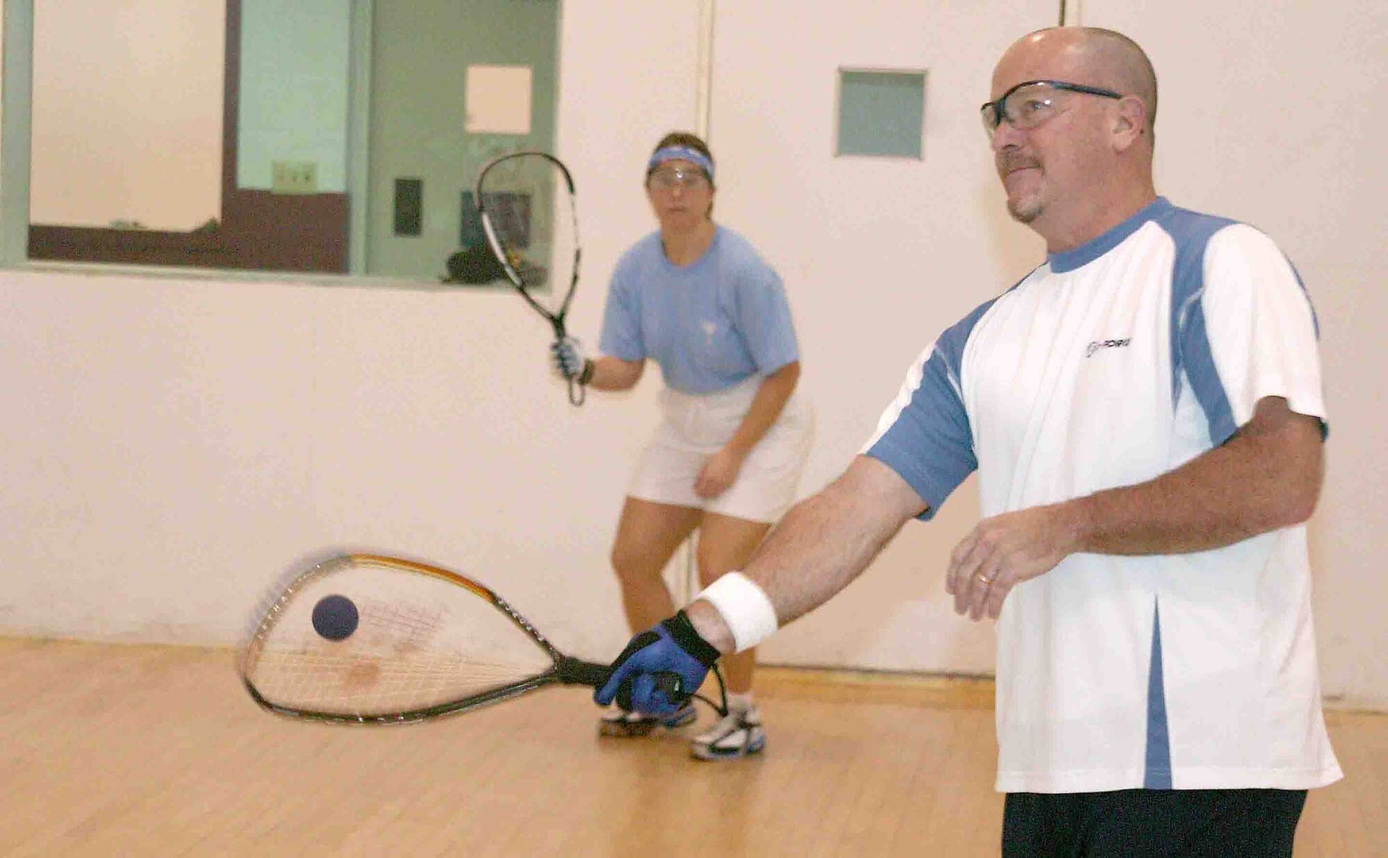 SHAW AIR FORCE BASE, S.C. -- Retired Maj. Ken Soileau and his friend, Joann Groover, play racquetball Dec. 13 at the fitness center. Intramural racquetball season begins Feb. 5. To enter a team, complete a letter of intent and turn it into the fitness center no later than Jan. 10. (U.S. Air Force photo/Senior Airman John Gordinier)